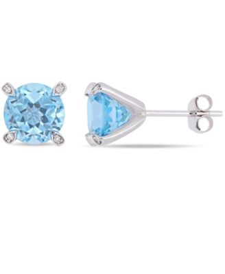 Gemstone and Diamond Accent Stud Earrings in 10k White Gold. Available in Blue Topaz (4-3/4 ct.t.w.), Citrine (3 5/8 ct.t.w), Garnet (4 ct.t.w.), Amethyst (3 ct. t.w.) & Prasiolite (3 1/2 ct.t.w.)