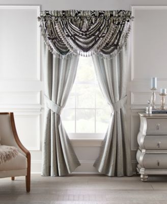 Croscill - The Dianella Curtain Panel Pair by  features a densely woven allover leaf design in light blue and soft gray.