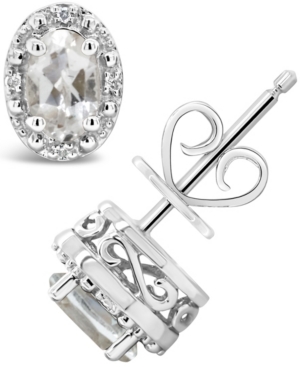 image of White Topaz (1-1/8 ct. t.w.) and Diamond Accent Stud Earrings in Sterling Silver