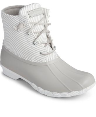 white and grey sperry boots