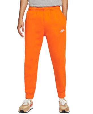 bright orange sweatpants