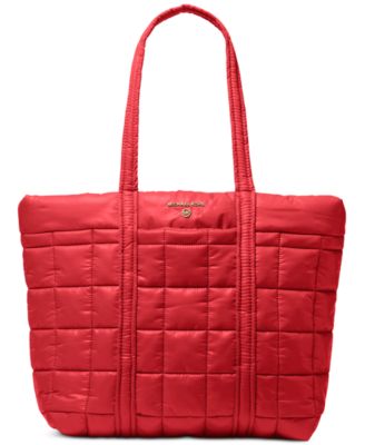 Photo 2 of MICHAEL Michael Kors Stirling Small Grab Tote Red
Top handles, 10" drop
Dimensions: 17.75"W x7.25"D x12.25"H - Dog clip closure
Two exterior slip pockets & three interior slip pockets
Quilted pattern