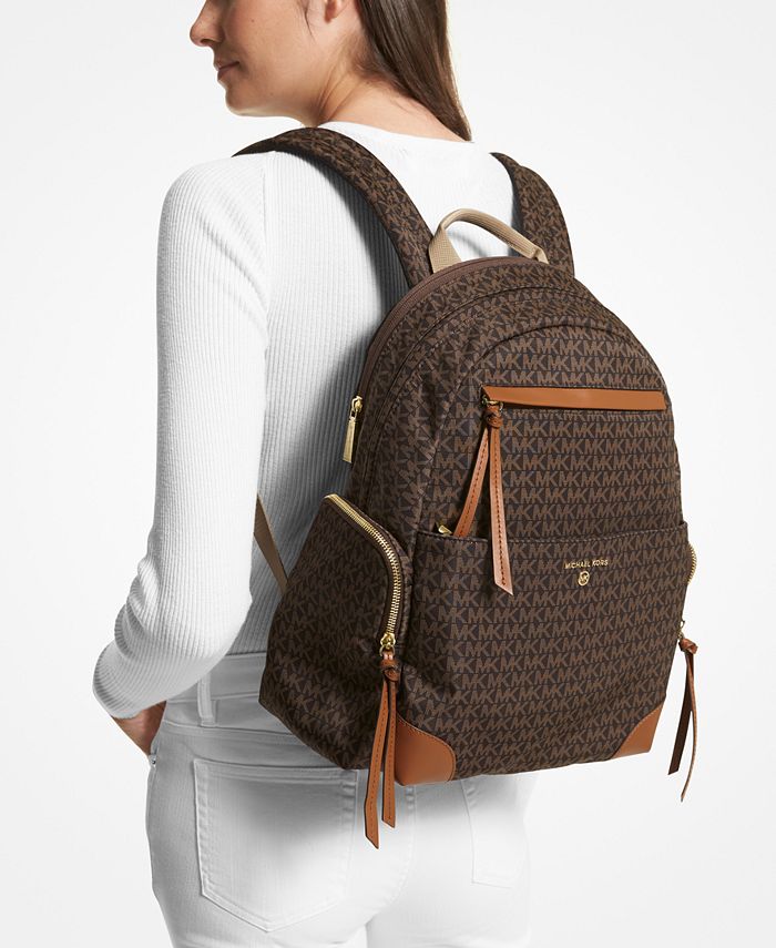 Buy the Michael Kors Monogram Backpack Brown