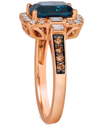 Chocolatier&reg; Deep Sea Blue Topaz (2-1/4 ct. t.w.) & Diamond (1/2 ct. t.w.) Halo Ring in 14k Rose Gold