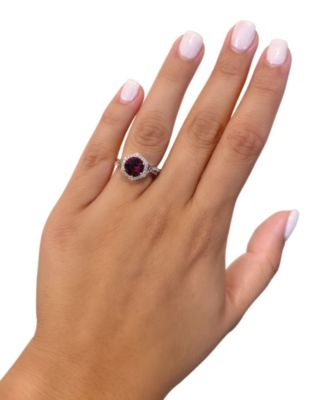 Raspberry Rhodolite (2-1/2 ct. t.w.) & Diamond (3/8 ct. t.w.) Halo Twist Ring in 14k Rose Gold