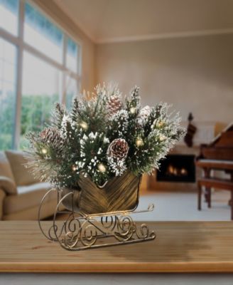 National Tree Company 10" Glittery Bristle Pine Sleigh with White Tipped Cones with 15 Warm White Battery Operated LED Lights w/ Timer