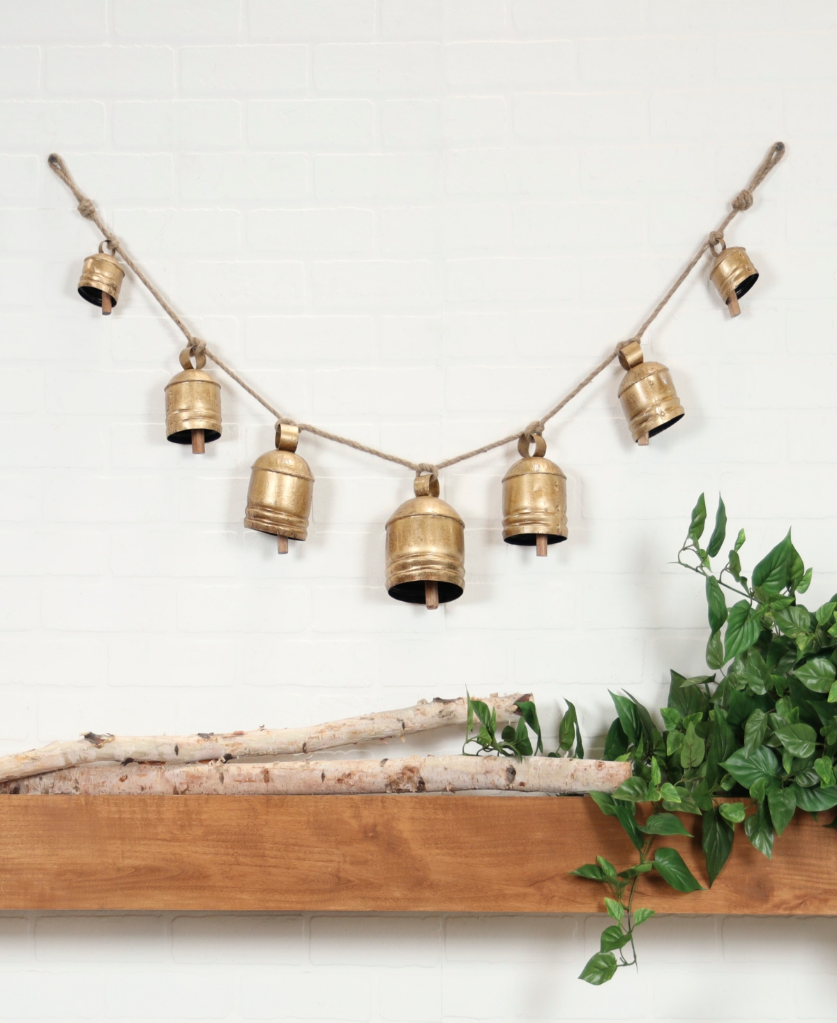 Rosemary Lane Metal Tibetan Inspired String Hanging Decorative Cow Bell With Jute Hanging Rope, 53" X 5" X 7" In Gold