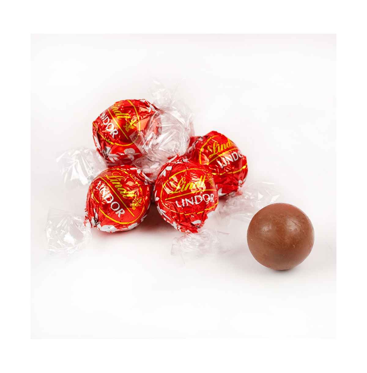 Christmas Candy Gift Tin with Chocolate Lindor Truffles by Lindt Large Plastic Tin with Sticker By Just Candy - Merry Christmas - Assorted pre-pack