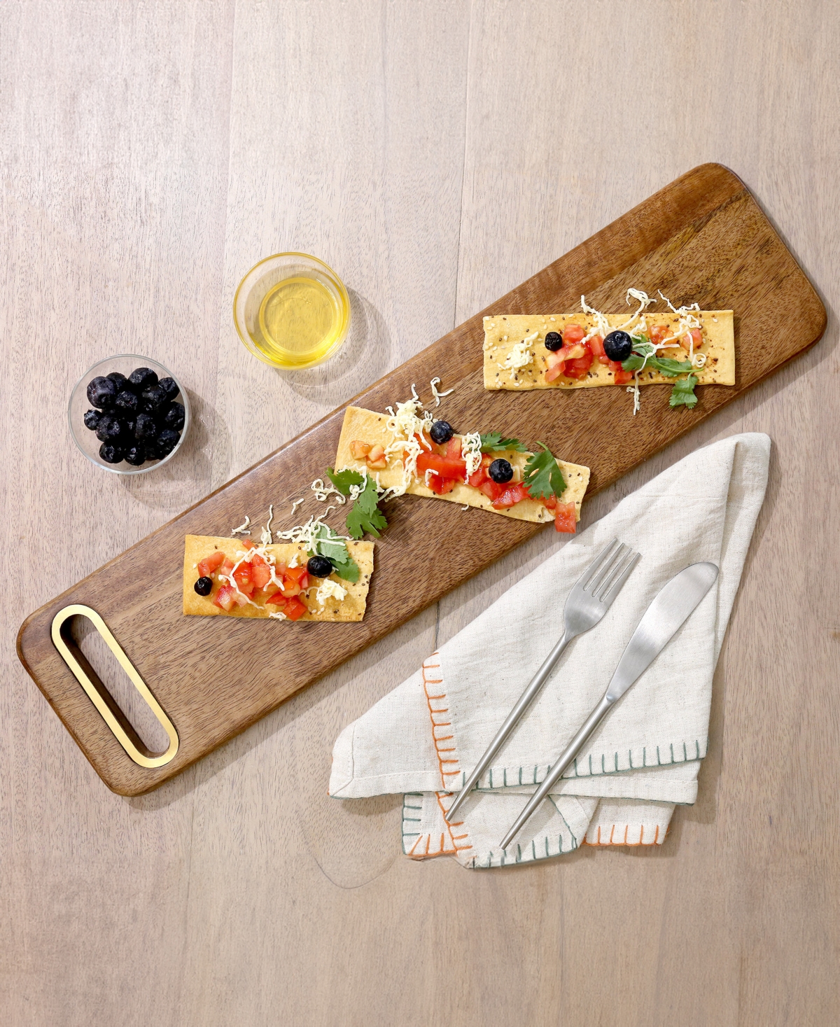 Shop Godinger Signature Collection Acacia Rectangle Wood Cutting Board With Brass Accents In Brown