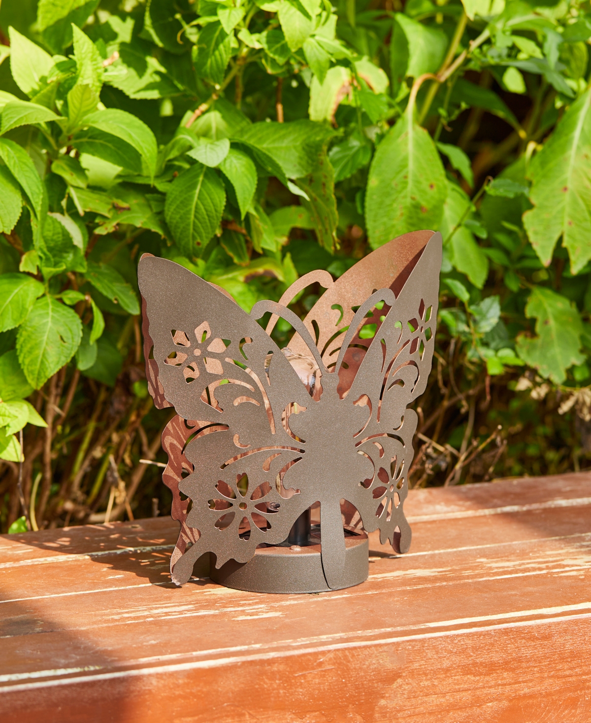 Glitzhome L Black and Gold-Tone Metal Cutout Flying Butterfly Silhouette Solar Powdered Edison Bulb Outdoor Lantern