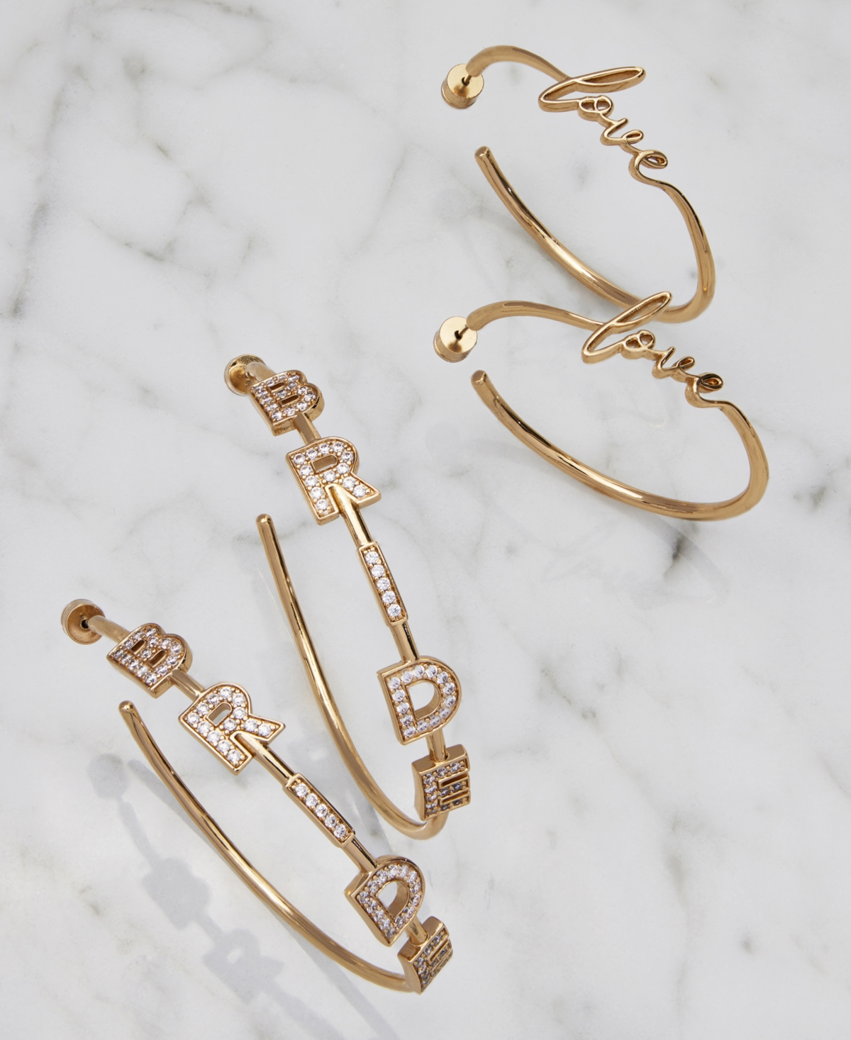 Shop Kleinfeld Gold-tone Love Script Hoop Earrings