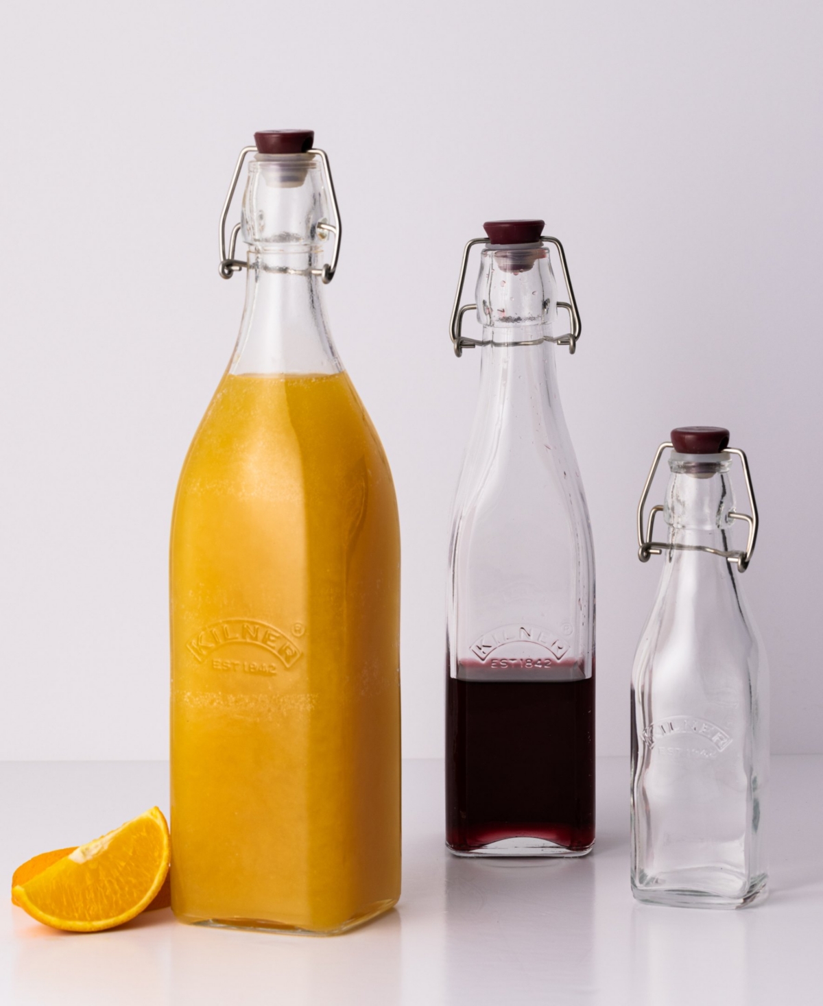 Kilner Set Of 8 Square Clip Top Bottles In Clear