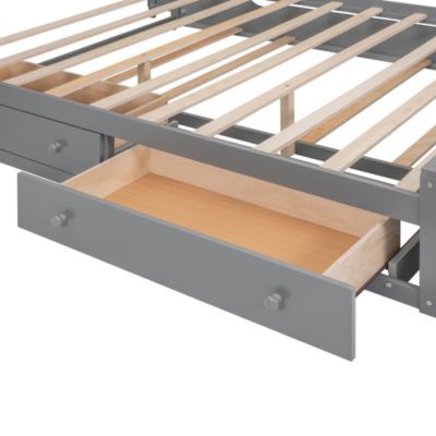 Wooden Queen Bed with Cabinetry and Outlets