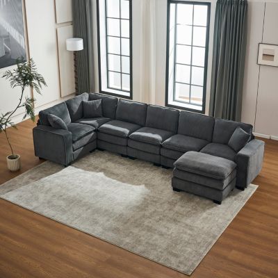 Modern U-Shaped 6-Seat Sectional Sofa with Ottoman and Pillows.