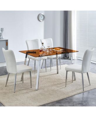 Table and chair set. Large modern rectangular table with brown glass top and silver metal legs. It comes with soft and comfortable PU seats, faux leather upholstered seats and silver metal legs.