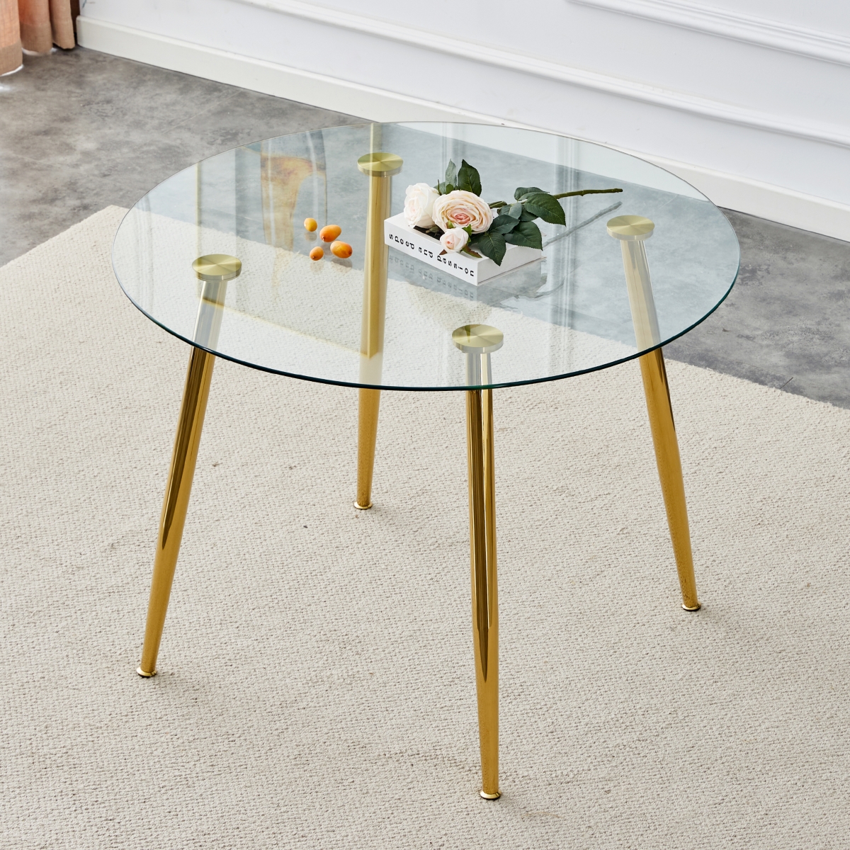 Streamdale Furniture A glass tabletop with a diameter of 40 inches and a modern minimalist circular dining table with gold plated metal legs. 40 ' 40'