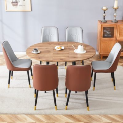Table and chair set.Modern Extendable Wood MDF Dining Table.The table has a telescopic design, suitable for gatherings of different size.Paired with 6 chairs with PU cushions and black metal legs.