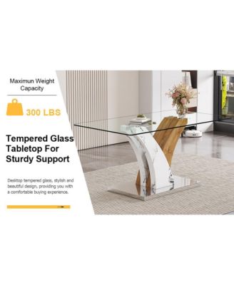 Table and chair set.Modern dining table, tempered glass countertop with artistic MDF legs.Paired with 6 comfortable chairs with PU seats and metal legs. Suitable for various decoration styles.