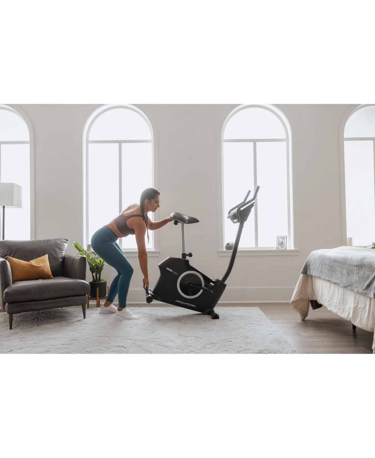 ProForm 225 Csx Upright Exercise Bike with inch Display, Built-In Tablet Holder and Fan