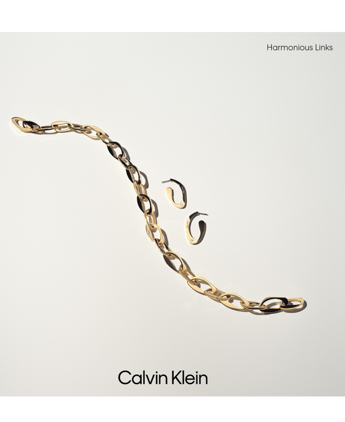 Calvin Klein Medium Pave Sculpted Elongated Hoop Earrings In Gold