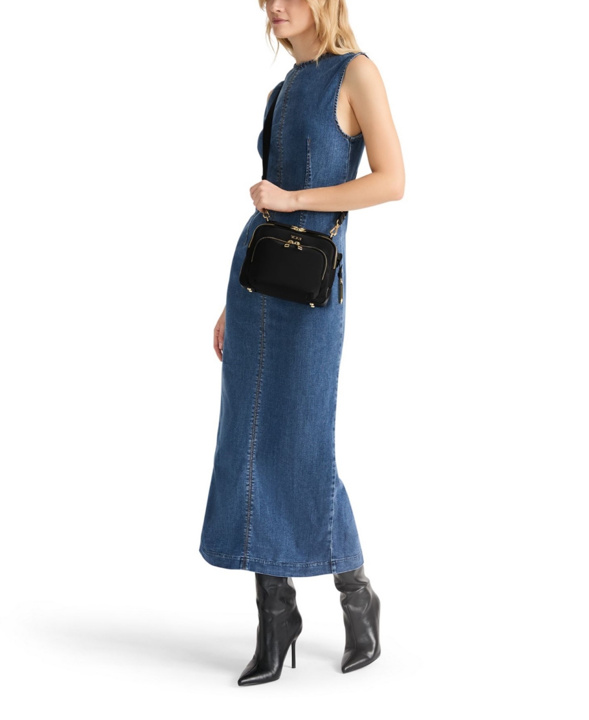 Shop Tumi Voyageur Teghan Crossbody Bag In Lavender