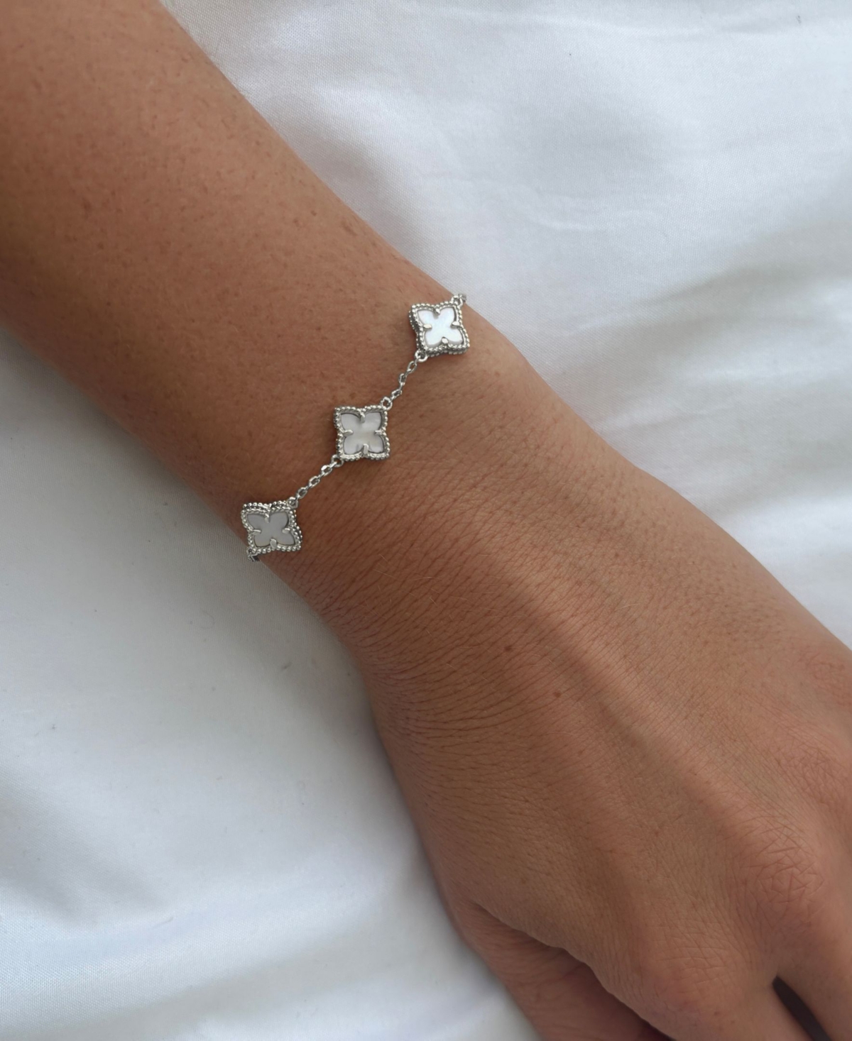 Adornia Silver Plated White Mother Of Pearl Flower Bracelet In Silver