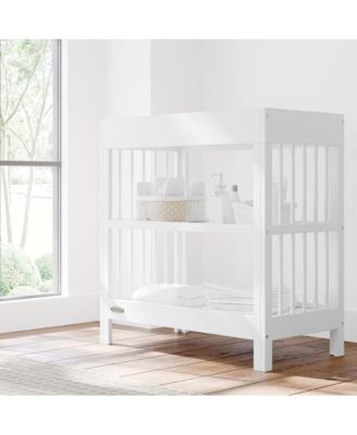 Teddi Changing Table with Water-Resistant Pine Wood Changing Pad - White