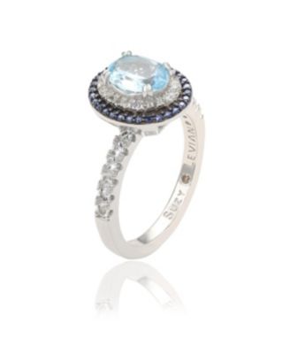Suzy Levian Sterling Silver Oval Cut Topaz and Sapphire Double Halo Ring