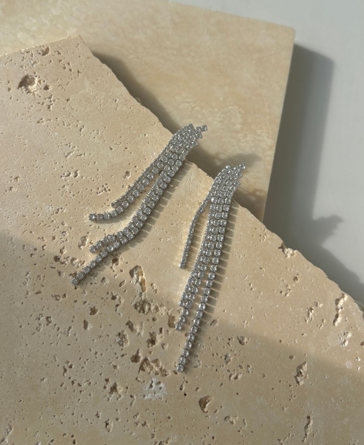Adornia Silver Crystal Cascade Sweeper Earrings In White