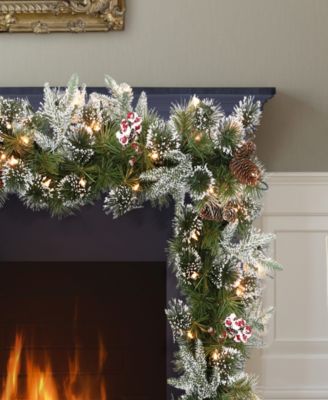 Puleo Pre-Lit Decorated Christmas Garland with 100 Lights, 9' x 10"