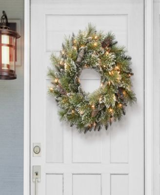 24 inch Prelit Premium Decorated wreath with 50 Clear Incandescent Lights