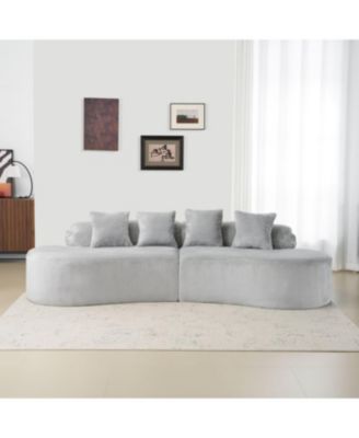 Streamdale Modern curved flannelette sofa with pillows in light gray.