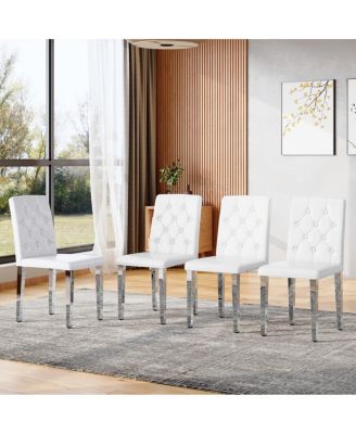 4-pack White PU dining chairs, ergonomic buckle backrest, 35"H, silver legs.