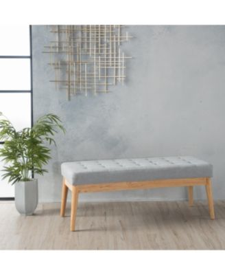tufted upholstered design with mid-century modern charm is offered as a stylish bench
