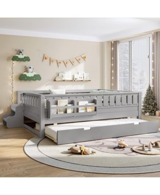 Full bed with bookshelves, staircase, safety rails, trundle