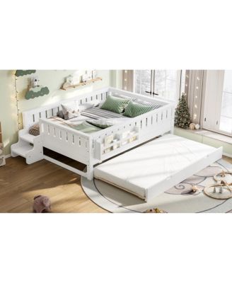 Full bed with bookshelves, staircase, safety rails, and trundle