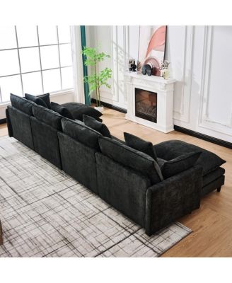  140.9" U-shaped modular sectional sofa with 2 ottomans, 4 cushions, 2 pillows.