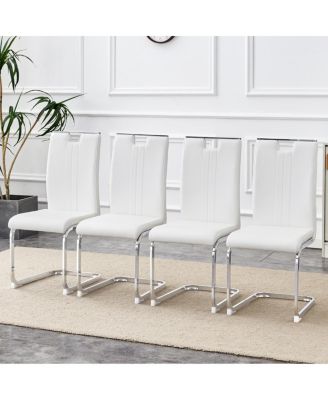 Set of 4 PU bow-shaped chairs for minimalist/contemporary homes.