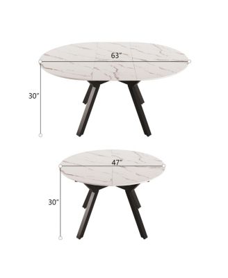 Expandable circular dining table set with 4 cushioned chairs.