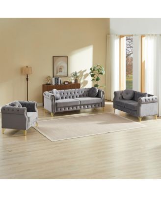 Velvet Chesterfield sofa with copper stud detailing & tufted buttons.