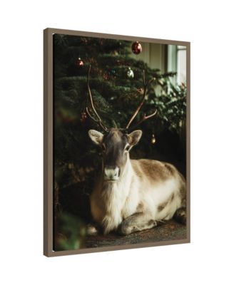 Sylvie Framed Canvas Reindeer Sitting Under a Christmas Tree by Michael Schauer