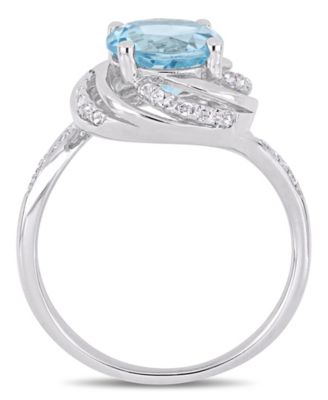 Blue Topaz (2-1/3 ct.t.w.), White Topaz (1/8 ct. t.w.) and Diamond Accent Interlaced Swirl Halo Ring in Sterling Silver