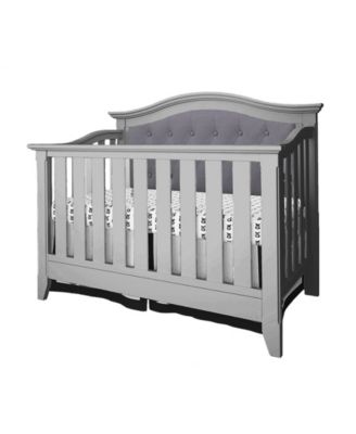 white upholstered crib