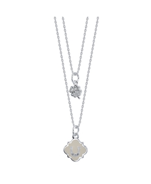 image of Unwritten White Enamel Horseshoe and Cubic Zirconia Clover Duo Necklace in Fine Silver Plate