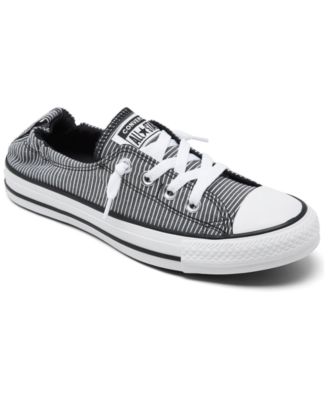white converse with black line