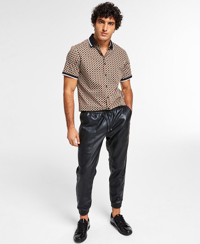 Stay stylish and comfortable in GUESS Men's Faux-Leather Jogger Pants
