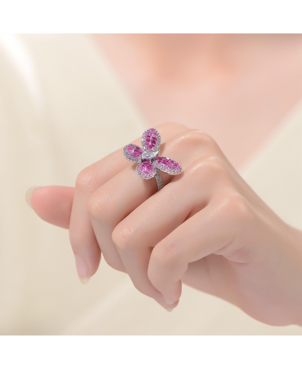 Genevive Sterling Silver with Rhodium Plated and Blue Cubic Zirconia Butterfly Ring