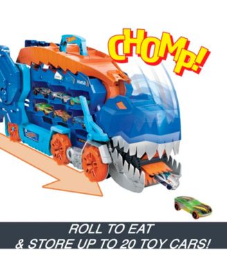 Hot Wheels City Ultimate Hauler, Transforms Into A T-Rex with Race