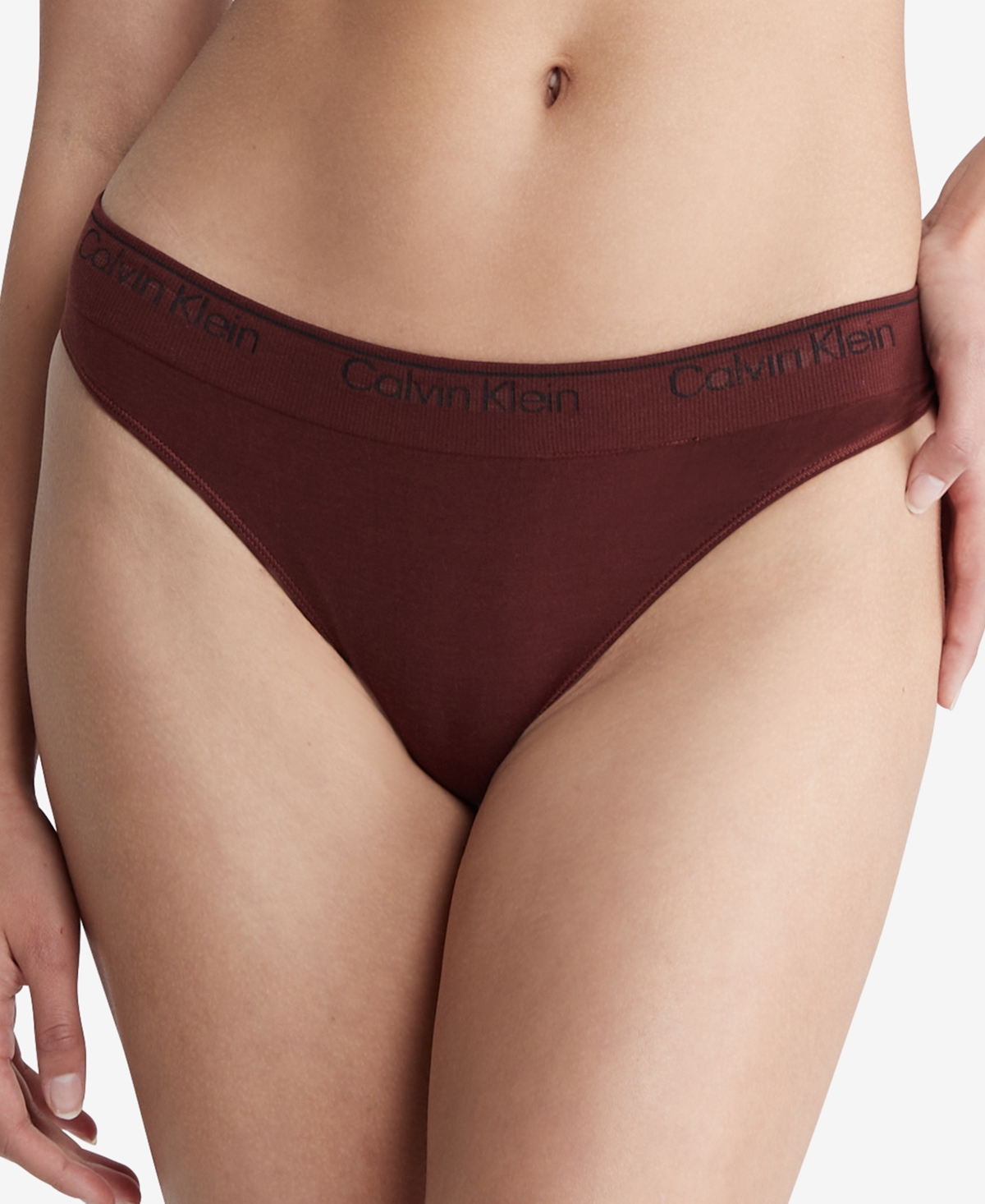 Shop Calvin Klein Modern Seamless Naturals Thong Underwear Qf7095 In Rum Raisin