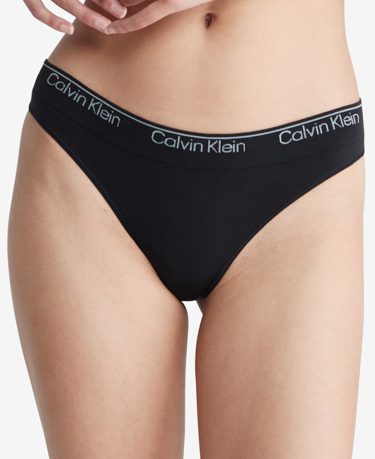 Shop Calvin Klein Modern Seamless Naturals Thong Underwear Qf7095 In Black